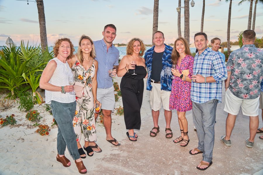 Corporate incentive travel photography during Bahamas reward trip beach gathering