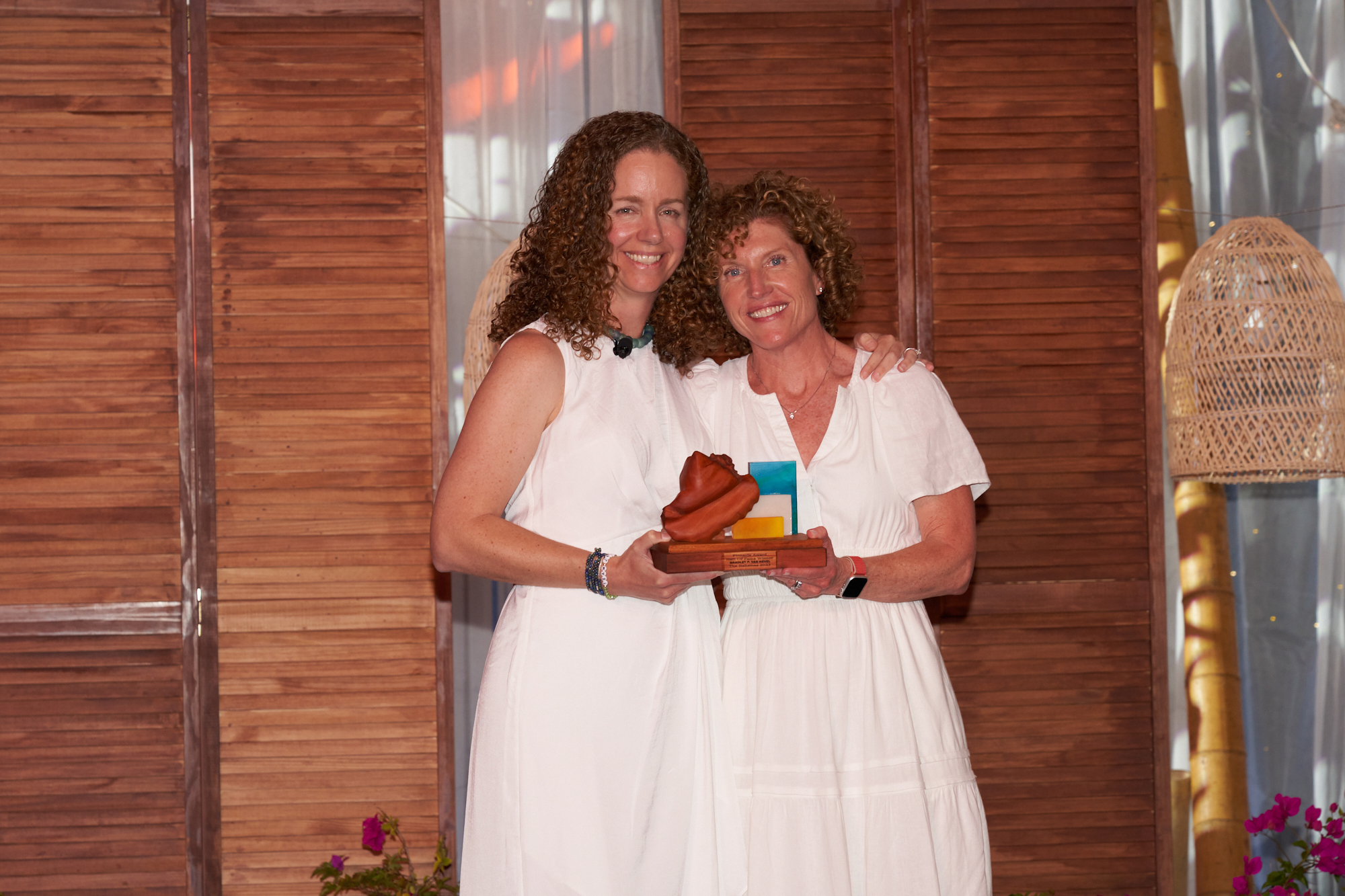 Award recipient recognized on stage during corporate incentive travel program
