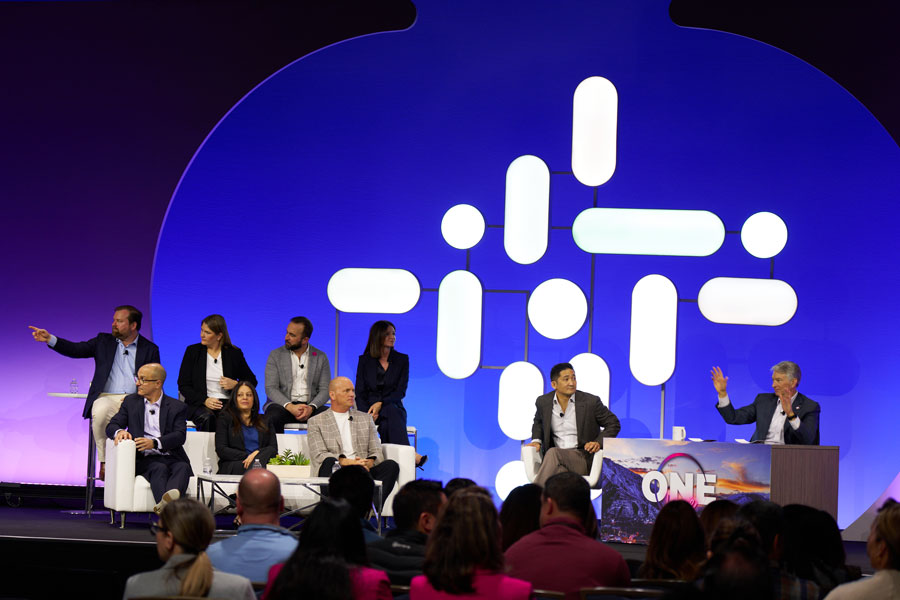 Executive panel discussion at corporate leadership conference