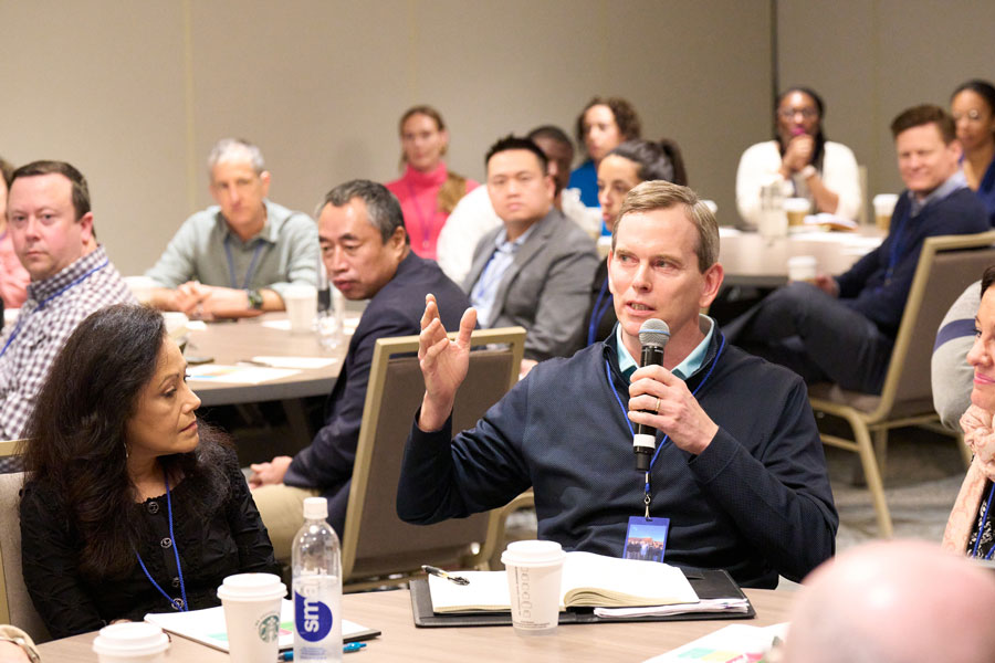 Breakout session discussion during corporate annual meetings in Park City, Utah