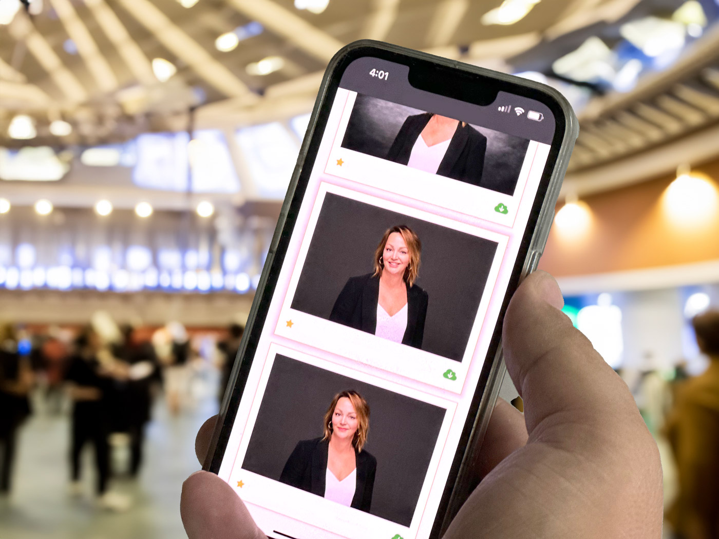 Attendee selecting professional trade show headshots from a mobile gallery